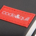 branded notebooks sewn printed label on notebook cover