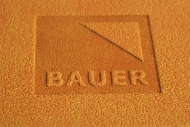textured pu makes the embossed logo stand out